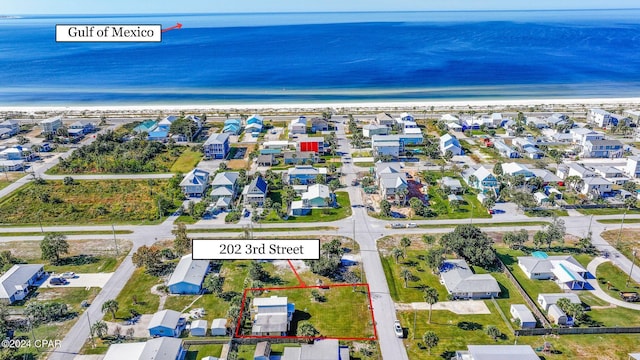 202 3rd St, Mexico Beach, FL 32456 - aerial perspective of suburban area featuring expansive beach and property boundaries highlighted