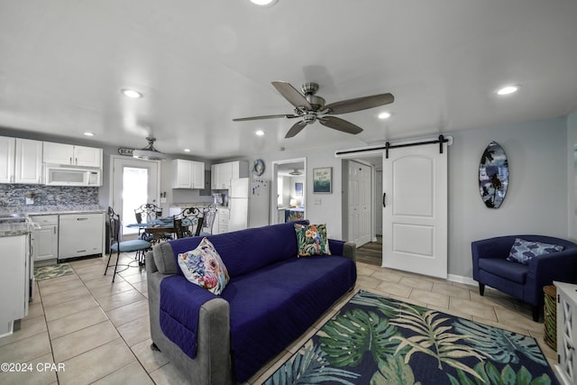 202 3rd St, Mexico Beach, FL 32456 - living area featuring a barn door, light tile patterned floors, a ceiling fan, recessed lighting, and baseboards