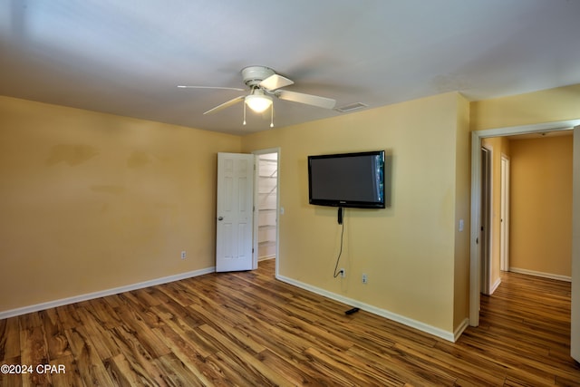 interior space featuring hardwood / wood-style flooring and ceiling fan