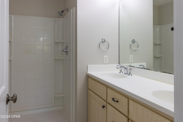 bathroom featuring vanity and walk in shower