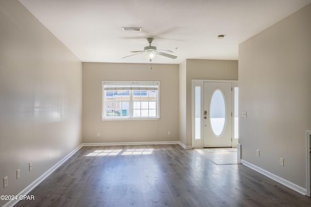 foyer with dark wood-type flooring and ceiling fan