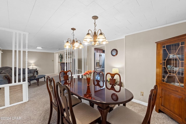 carpeted dining space with a notable chandelier and crown molding