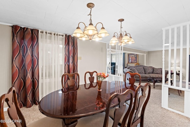 dining space with carpet and a notable chandelier