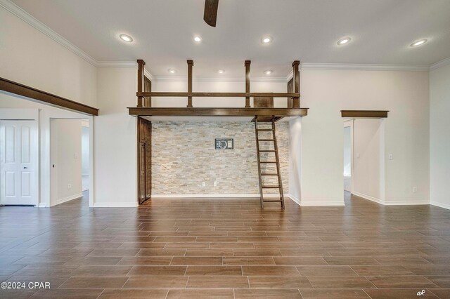 unfurnished living room with crown molding, dark hardwood / wood-style floors, and ceiling fan