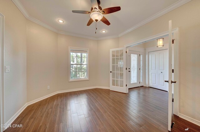 empty room featuring french doors, ceiling fan, wood-type flooring, and ornamental molding