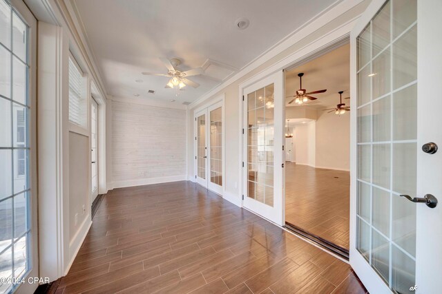 unfurnished sunroom with french doors