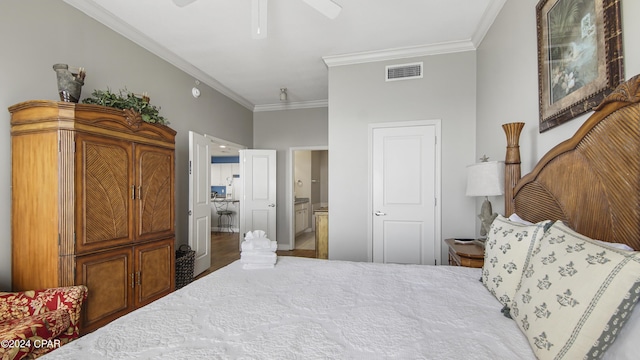 bedroom featuring ensuite bathroom, ceiling fan, wood finished floors, visible vents, and crown molding