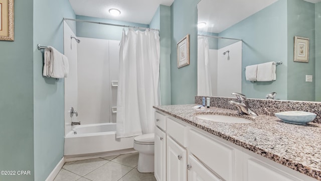 bathroom with shower / tub combo, baseboards, toilet, tile patterned flooring, and vanity