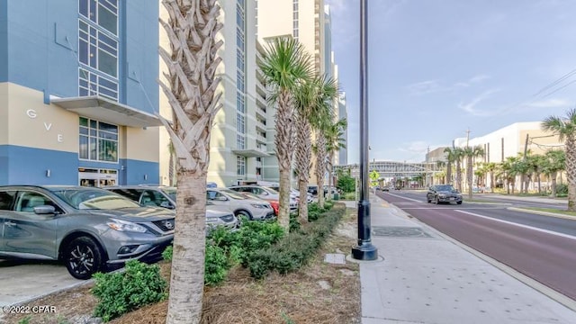 view of road with curbs and sidewalks