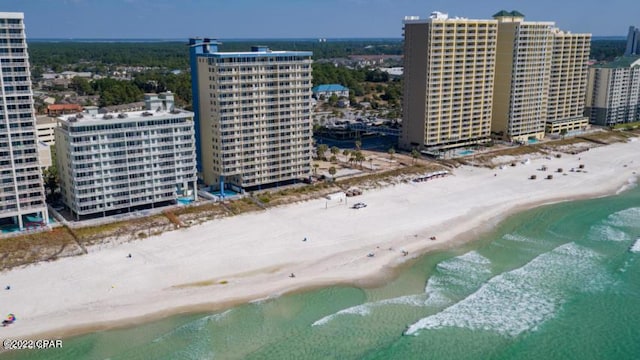 drone / aerial view with a view of the beach and a city view