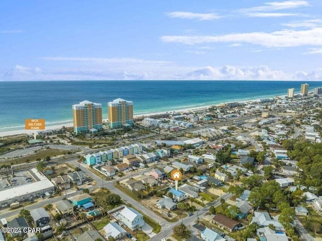 aerial view with a view of the beach and a water view