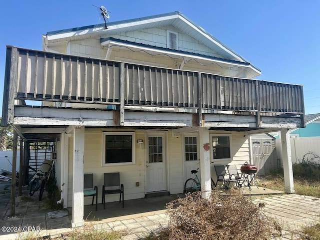 rear view of property with a patio