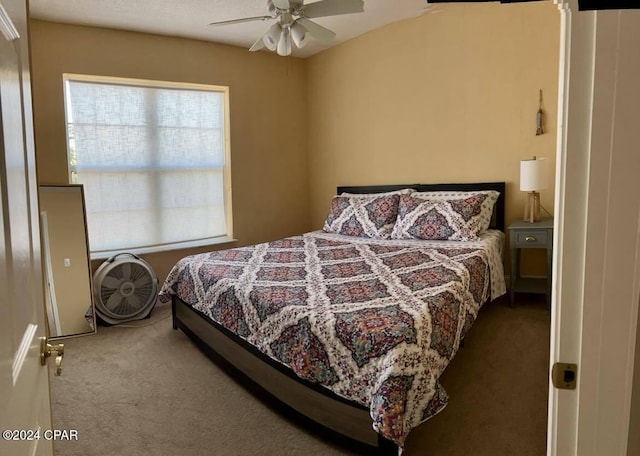 bedroom featuring ceiling fan and carpet flooring