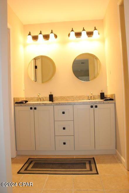 bathroom featuring vanity and tile patterned floors