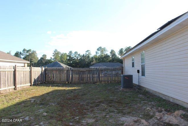 view of yard featuring central AC