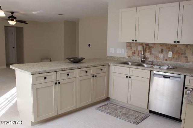 kitchen featuring kitchen peninsula, backsplash, stainless steel dishwasher, light tile patterned flooring, and sink