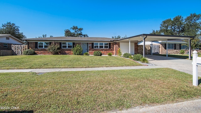 view of front of property featuring a carport and a front yard