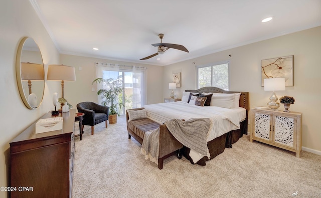 carpeted bedroom featuring ceiling fan, ornamental molding, and multiple windows