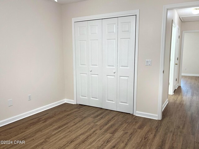 bathroom with vanity, wood-type flooring, and toilet