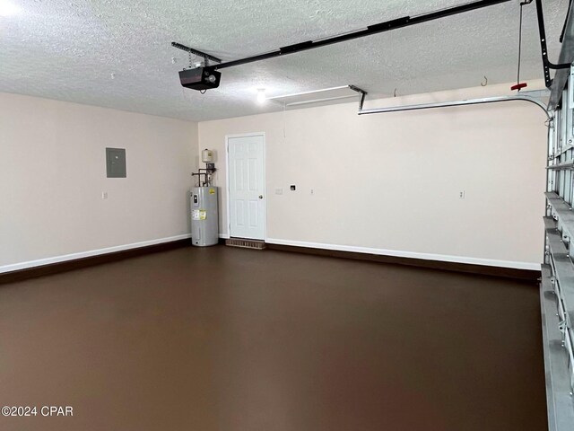 garage featuring a garage door opener, electric panel, and electric water heater