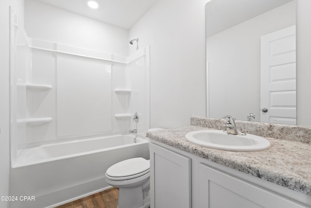 full bathroom featuring toilet, shower / tub combination, vanity, and wood-type flooring