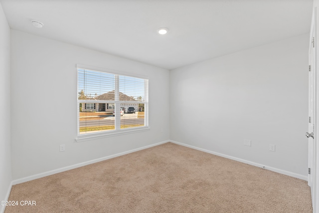 view of carpeted spare room