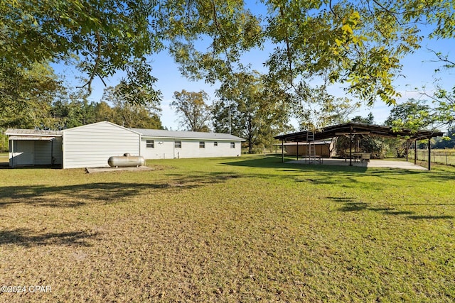 view of yard featuring a gazebo and a patio area