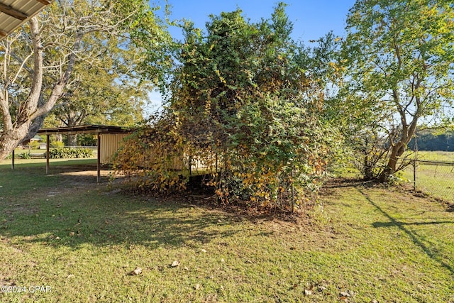 view of yard featuring a carport