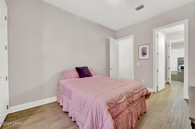 bedroom featuring light hardwood / wood-style floors