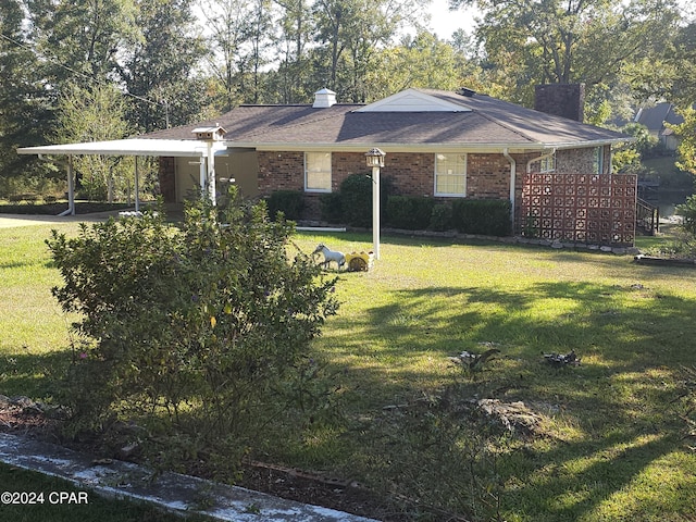 exterior space featuring a carport