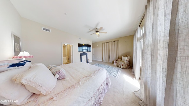 8700 Front Beach Rd Unit 5309, Panama City Beach, FL 32407 - bedroom featuring ceiling fan, carpet, visible vents, and connected bathroom
