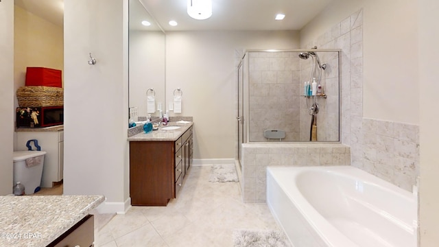 8700 Front Beach Rd Unit 5309, Panama City Beach, FL 32407 - full bath featuring a stall shower, baseboards, a bath, tile patterned floors, and vanity