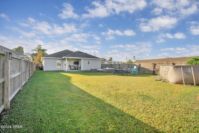 view of yard with a patio area