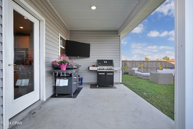 view of patio / terrace featuring outdoor lounge area and a grill