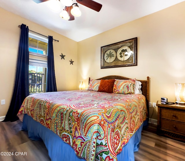 bedroom featuring dark wood-type flooring and ceiling fan