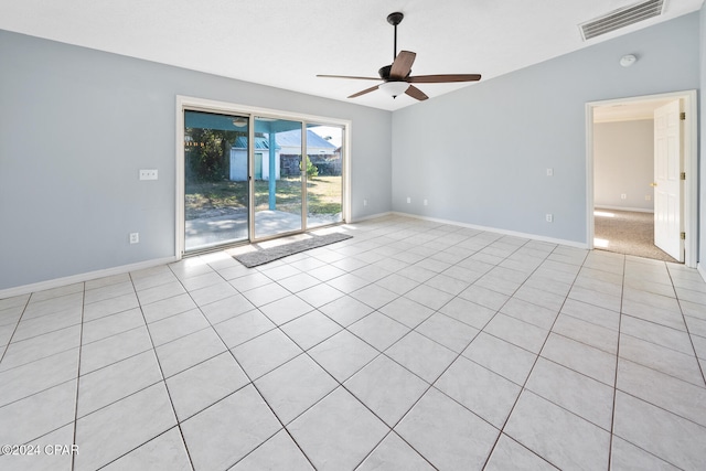 spare room with light tile patterned floors and ceiling fan