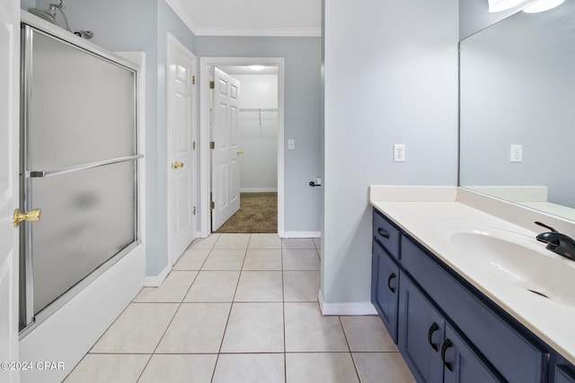 bathroom featuring vanity, tile patterned flooring, and crown molding