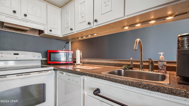 kitchen with white cabinetry, sink, and white appliances