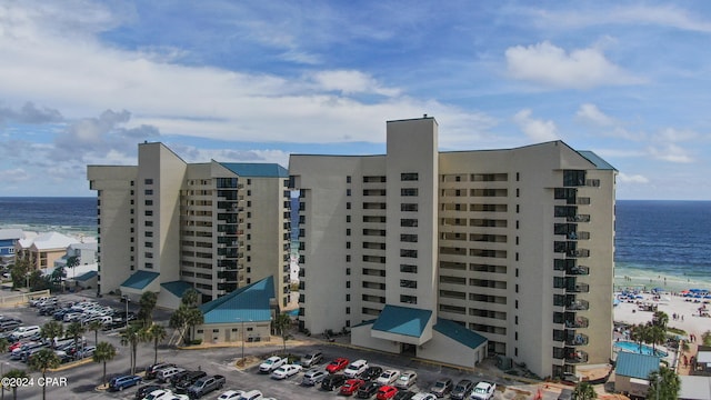 view of building exterior with a water view