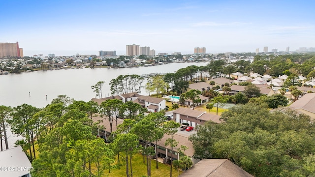 birds eye view of property with a water view