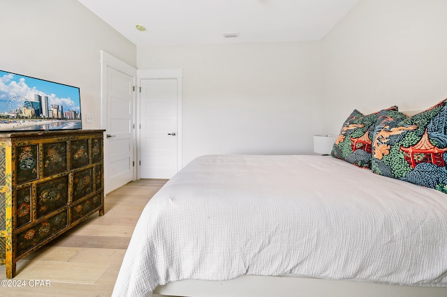 bedroom with light wood-style flooring