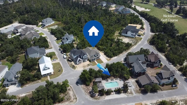 birds eye view of property with a residential view