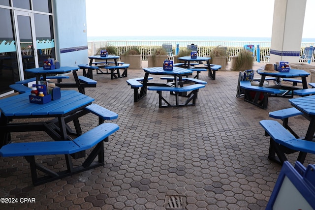 view of patio / terrace featuring a water view