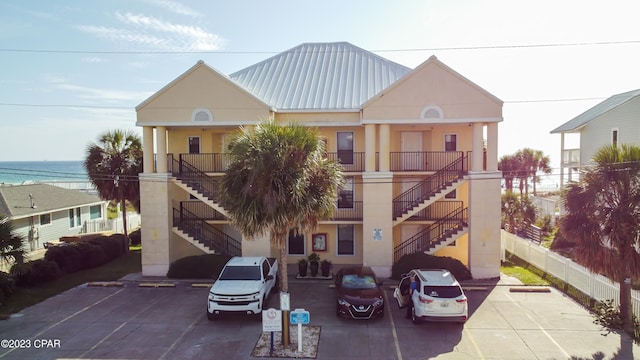 view of front of home with a water view