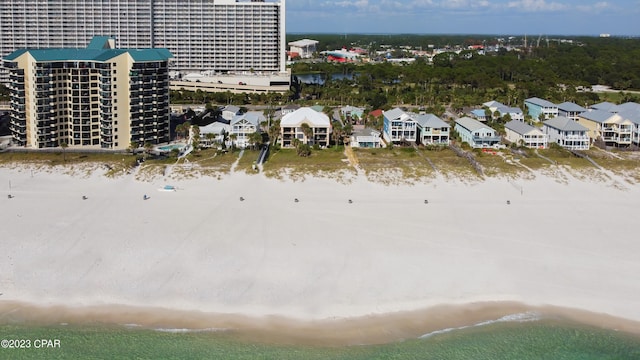 aerial view featuring a water view and a beach view