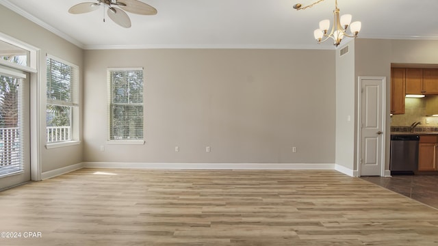 interior space featuring light hardwood / wood-style floors, a healthy amount of sunlight, and crown molding