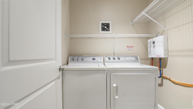 laundry room with washer and clothes dryer