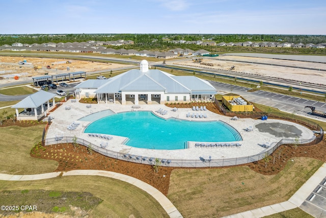 community pool with a patio