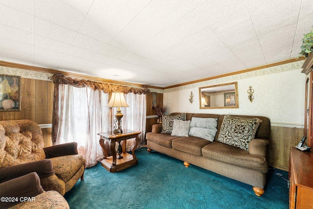 carpeted living room featuring ornamental molding