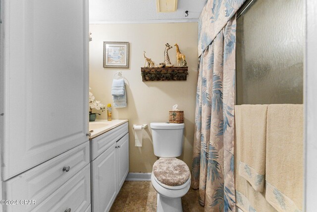 bathroom featuring toilet, wood walls, and walk in shower